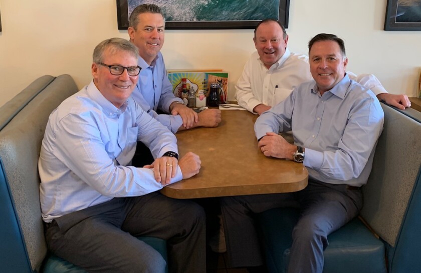 It was 25 years ago when (clockwise from front left) Mike Rosenberg, Allen Lynch, Michael Gottlieb and W. Chip Eggers gathered at Local Yolk to create Westcoast Sports Associates.