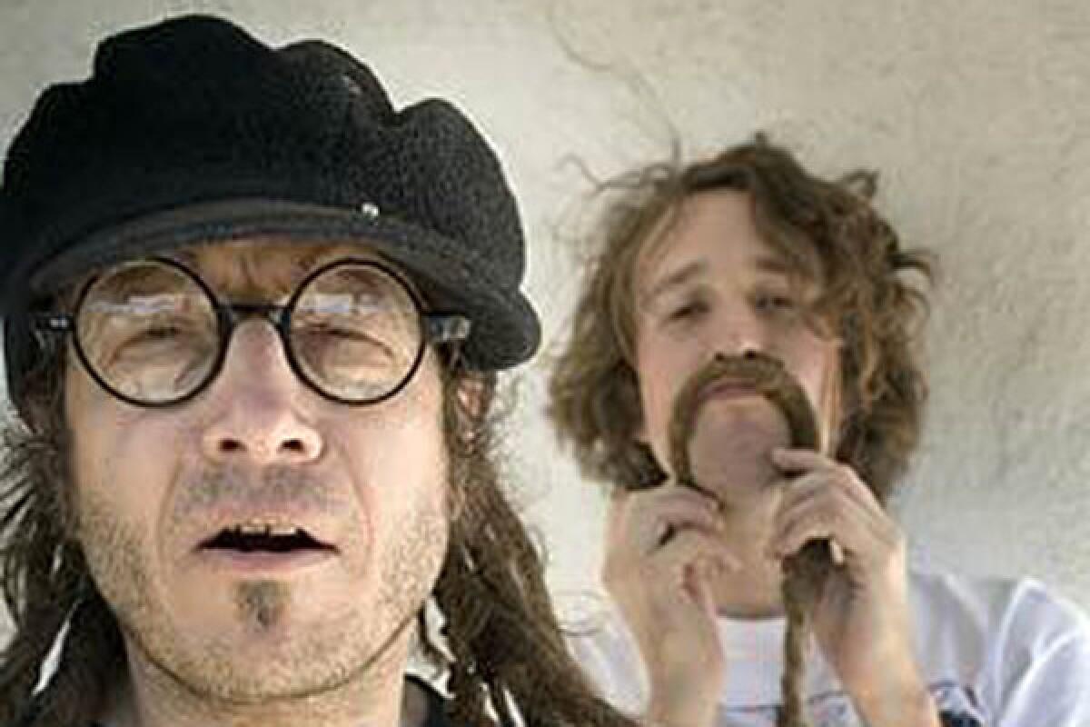 Keith Morris of Flag and FYF Fest's Sean Carlson. A judge has ruled in favor of Morris' new outfit Flag, in a trademark infringement lawsuit brought by Morris' former Black Flag bandmate Greg Ginn.