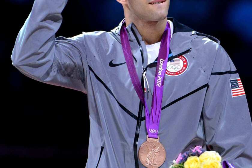 Team USA gymnast Danell Leyva celebrates his bronze medal in the men's individual all-around at the 2012 London Olympics.