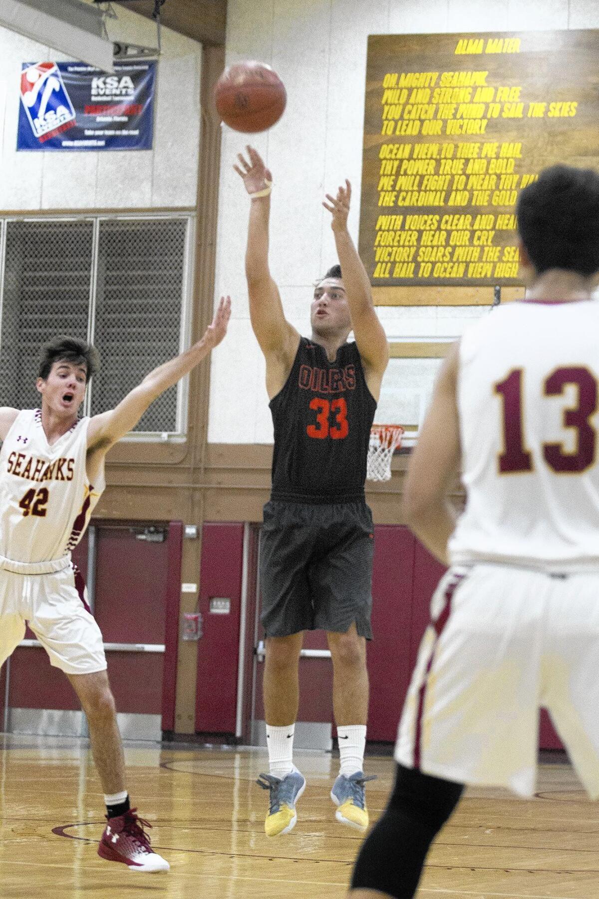 Huntington Beach High’s Noah Gonzalez (33) knocked down seven three-pointers for 21 points against Ocean View.