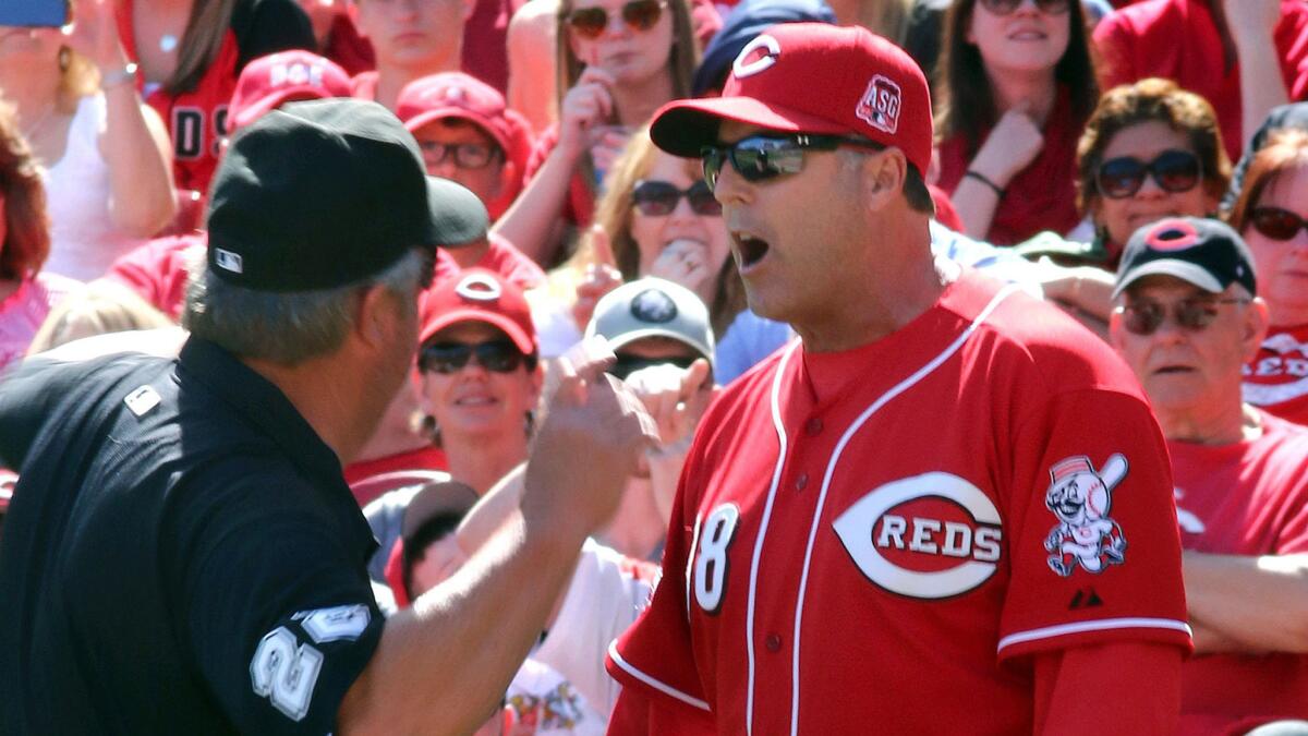 Cincinnati Reds Manager Bryan Price is ejected by umpire Joe West while arguing a call during a game against the St. Louis Cardinals on April 12.