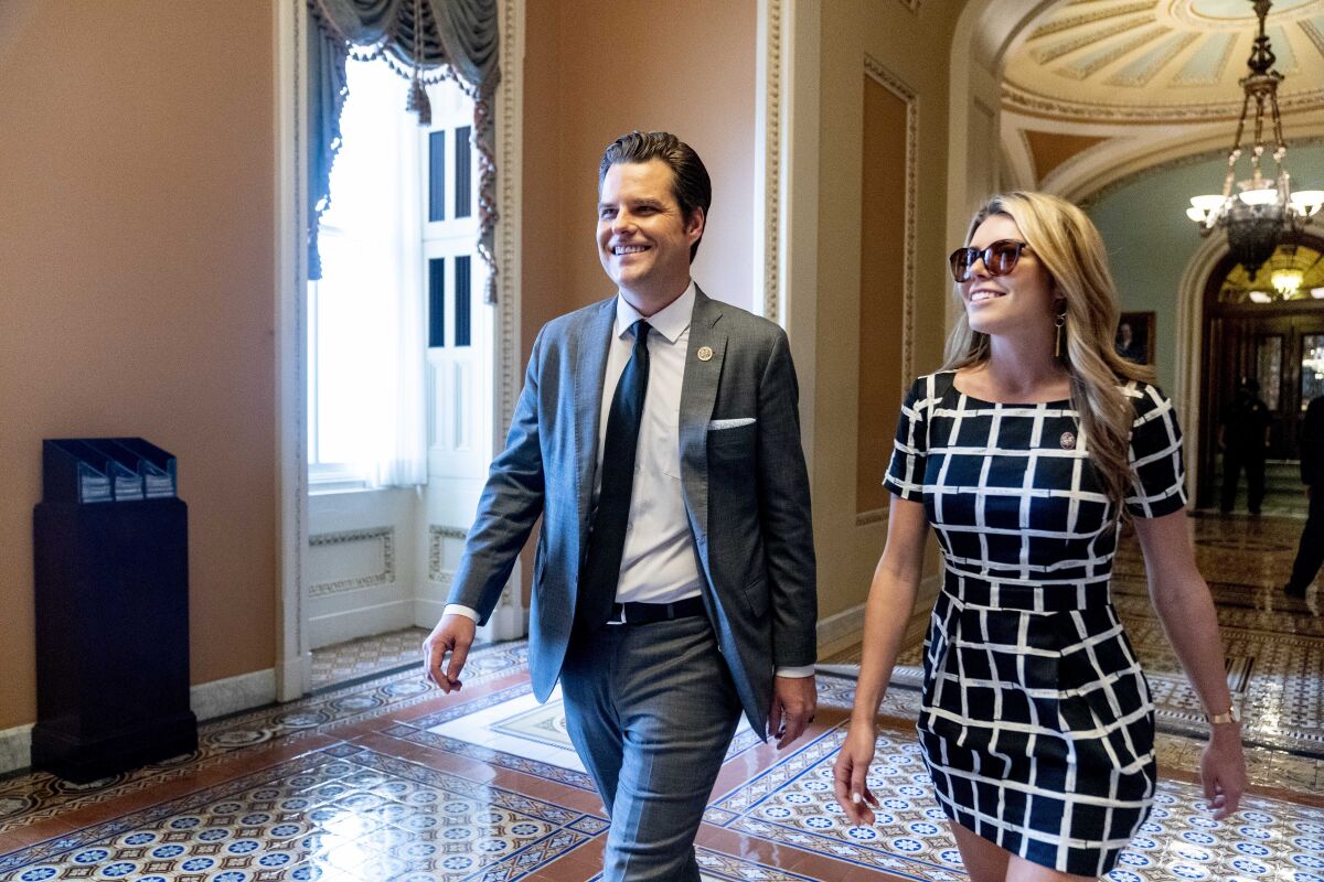 Rep. Matt Gaetz, R-Fla., and his wife Ginger Luckey walk through the U.S. Capitol Building in Washington, Tuesday, Sept. 28, 2021. (AP Photo/Andrew Harnik)