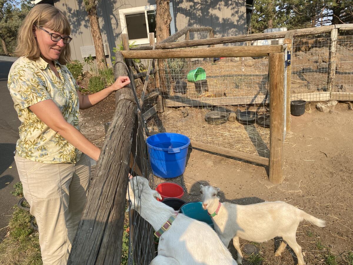 Woman tending goats in Bend, Ore., has decided not to get vaccinated