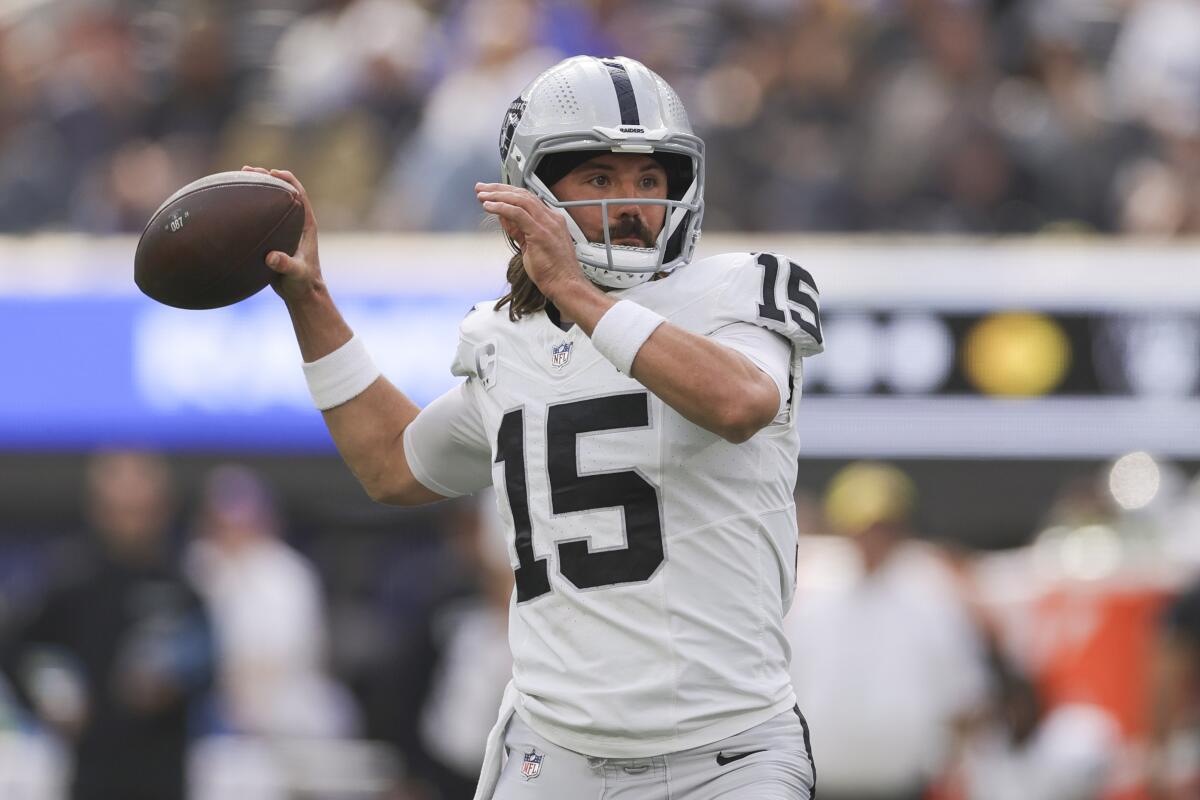 Las Vegas Raiders quarterback Gardner Minshew passes during the first half Sunday against the Rams at SoFi Stadium.