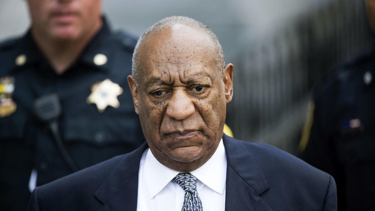 Bill Cosby leaves Montgomery County Courthouse after a hearing in his sexual assault case in Norristown, Pa., on Aug. 22, 2017.