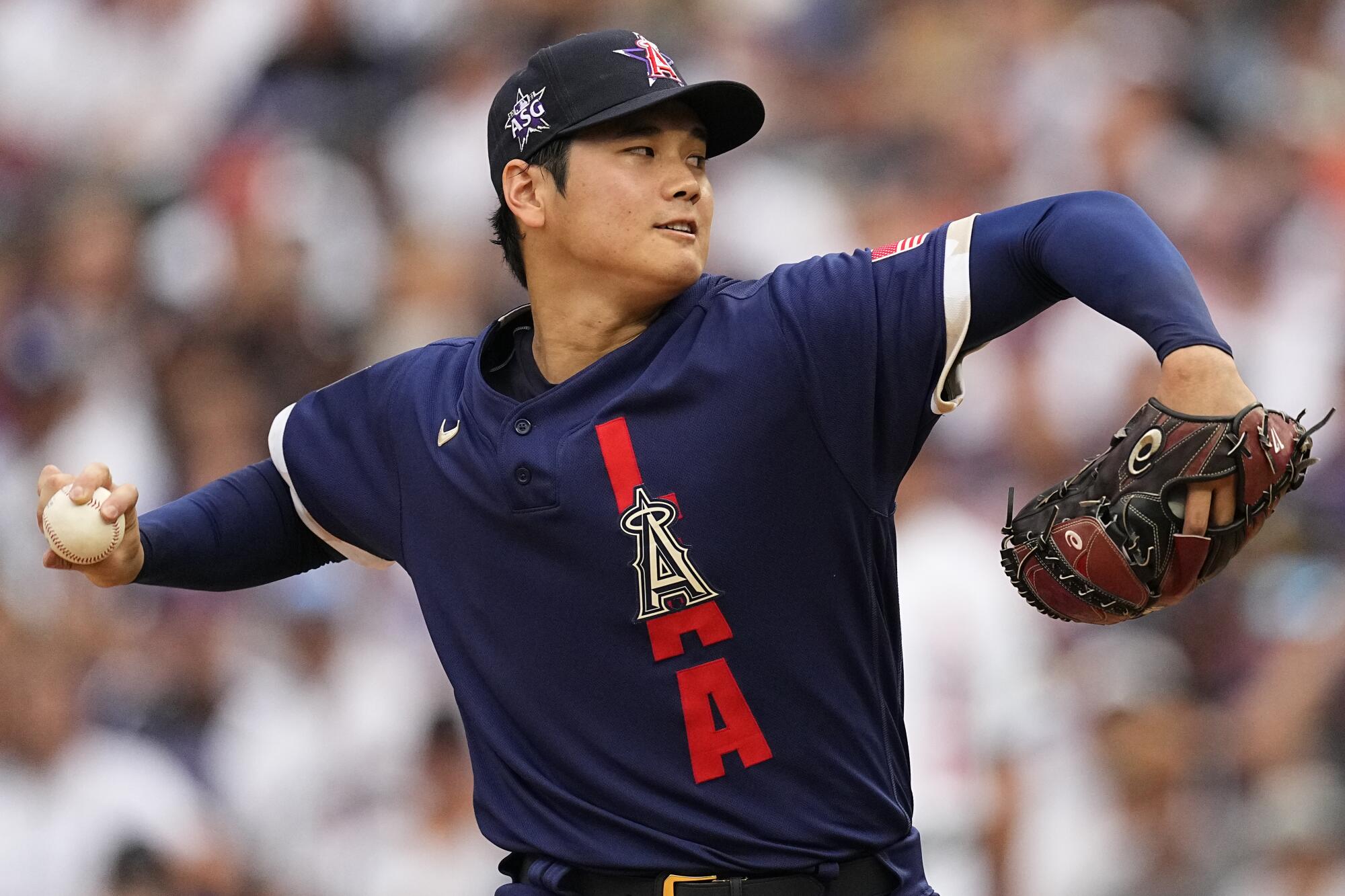 American League's starting pitcher Shohei Ohtani, of the Los Angeles Angeles, throws during the first inning 