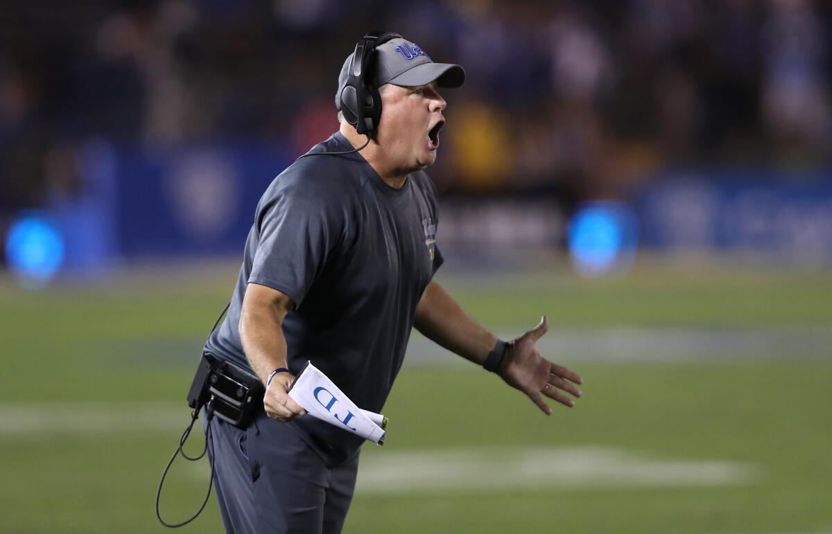 UCLA coach Chip Kelly has an animated discussion with officials during the Bruins' game with Arizona State on Oct. 26 at the Rose Bowl.