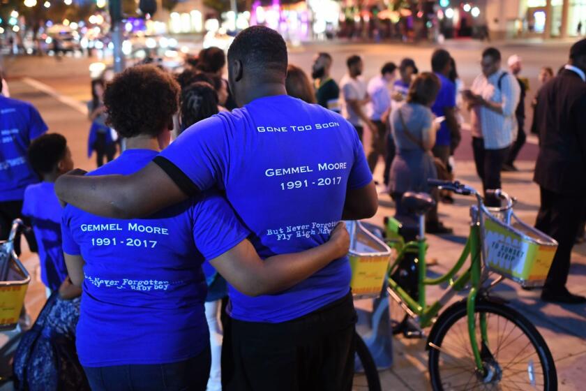 WEST HOLLYWOOD, CALIFORNIA AUGUST 18, 2017-Friends, family and supporters gather for a candelight vigil outside the West Hollywood Sheriff's station Friday. Gemmel Moore was found dead of a drug overdose in the home of prominent Democratic donor Ed Buck and the family wants an investigation. (Wally Skalij/Los Angeles Times)