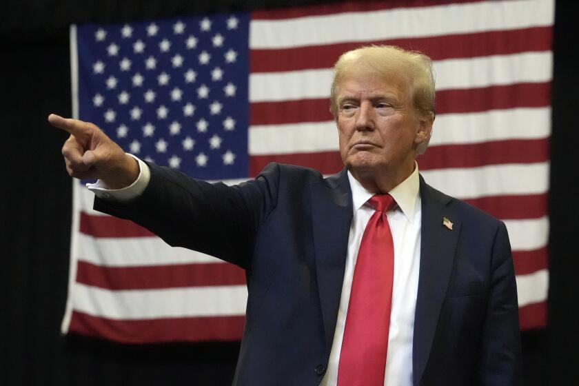 Republican presidential nominee former President Donald Trump arrives to speak at a campaign rally in Bozeman, Mont., Friday, Aug. 9, 2024. (AP Photo/Rick Bowmer)