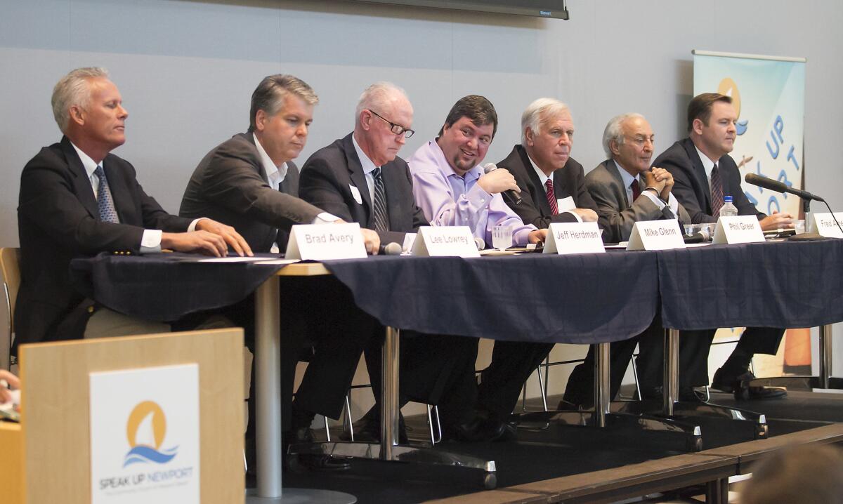 Newport Beach City Council candidates Brad Avery, Lee Lowrey, Jeff Herdman, Mike Glenn, Phil Greer, Fred Ameri and Will O Neill, from left, discuss civic issues during a Speak Up Newport forum at the Newport Beach Civic Center on Wednesday, Sept. 14, 2016.