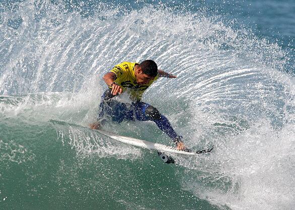 Holding on to his board