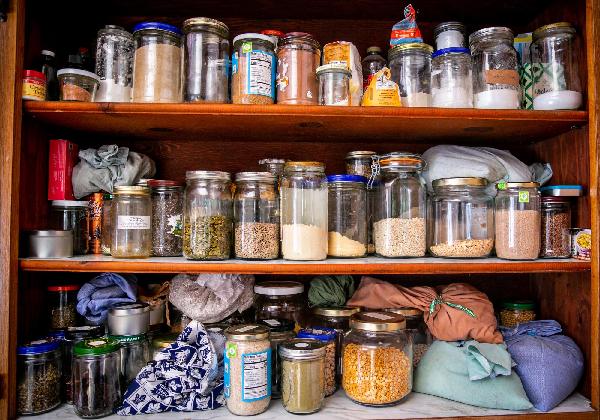 Anne-Marie Bonneau' stores most of her food in repurposed containers.