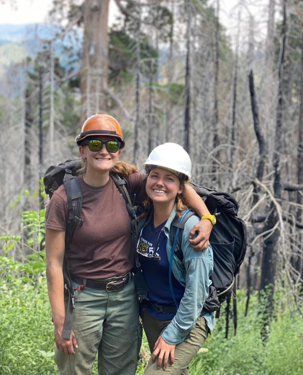 Fire ecologists Linnea Hardlund and Katie Ohlin, right, in the burned-out Black Forest in 2020. 