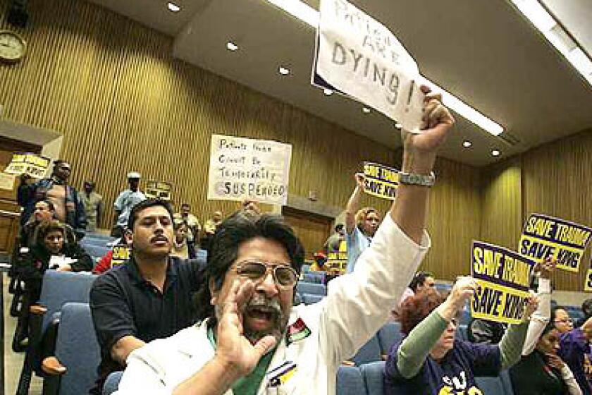 Fred Huicochea, a nurse at King/Drew Medical Center, jeers with others in the crowd at the county Hall of Administration as supervisors sealed the trauma centers fate.