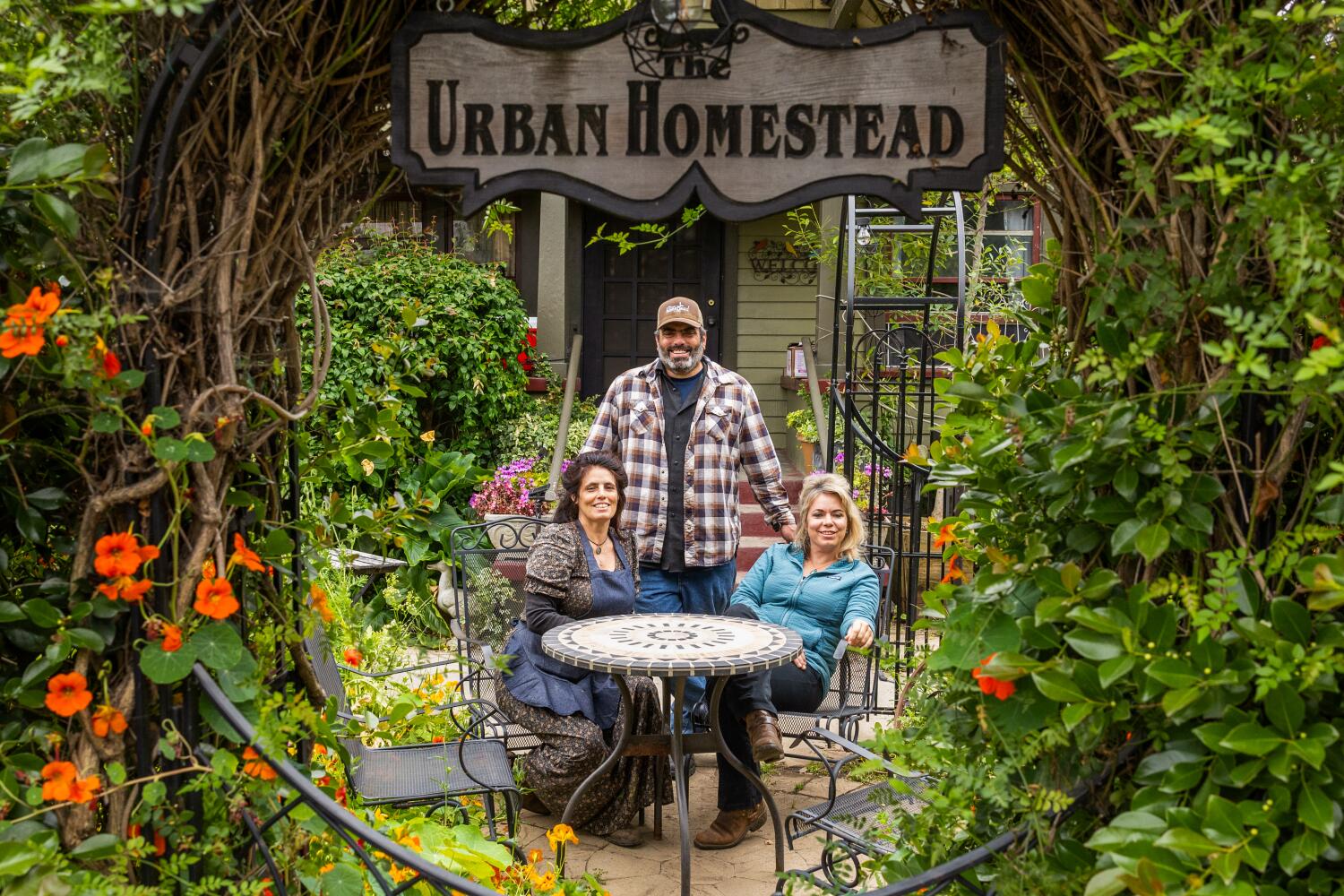 Seeking a simpler life, he built an urban homestead. Now his family keeps it growing