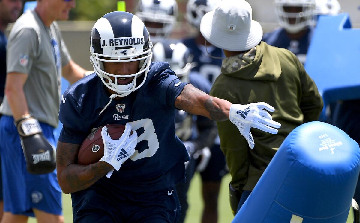 Rams wide receiver Josh Reynolds runs through a drill.