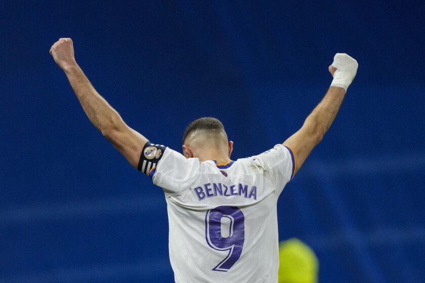 Real Madrid's Karim Benzema celebrates after scoring the opening goal during a match against Athletic Bilbao's at Santiago Bernabeu stadium in Madrid, Spain, Wednesday, Dec. 1, 2021. (AP Photo/Bernat Armangue)