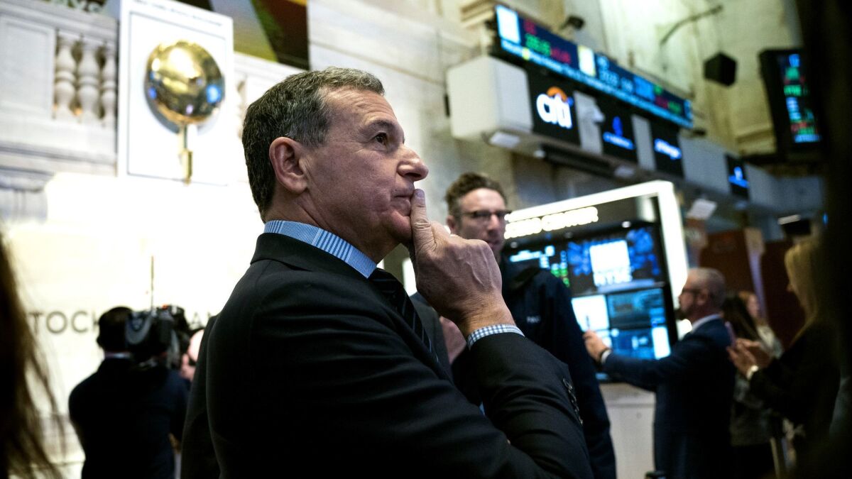 Disney CEO Bob Iger on the floor of the New York Stock Exchange in 2017, celebrating the company's 60th anniversary as a listed company.