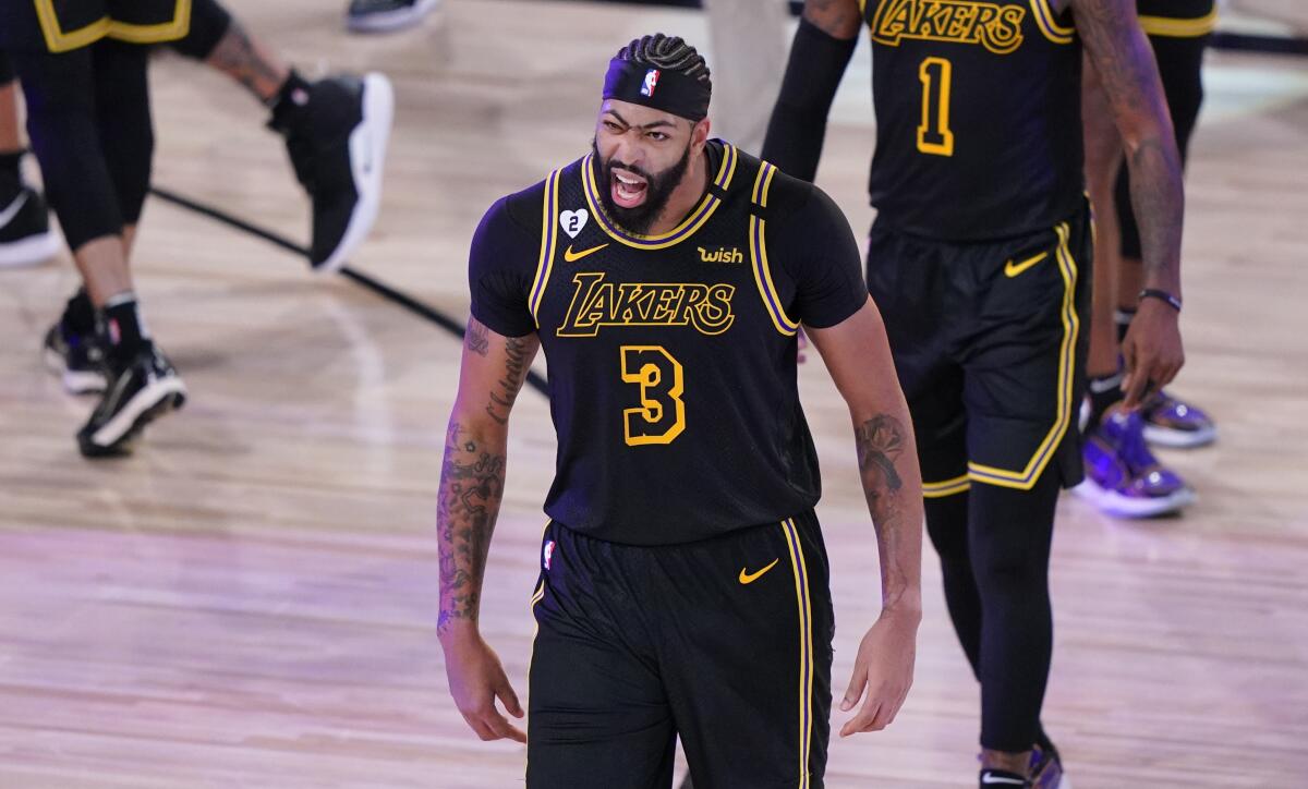 Lakers forward Anthony Davis celebrates after the team's 105-103 victory.