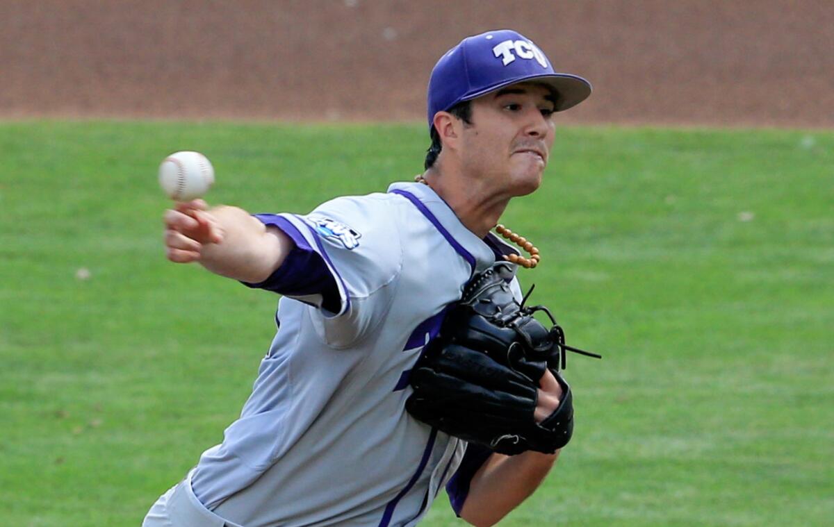 Texas Christian starter Preston Morrison delivers a pitch in the first inning against Louisiana State on Sunday in the College World Series.