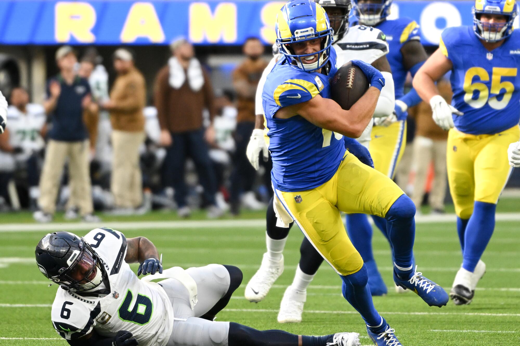 Rams wide receiver Cooper Kupp catches a short pass against the Seattle Seahawks at SoFi Stadium.