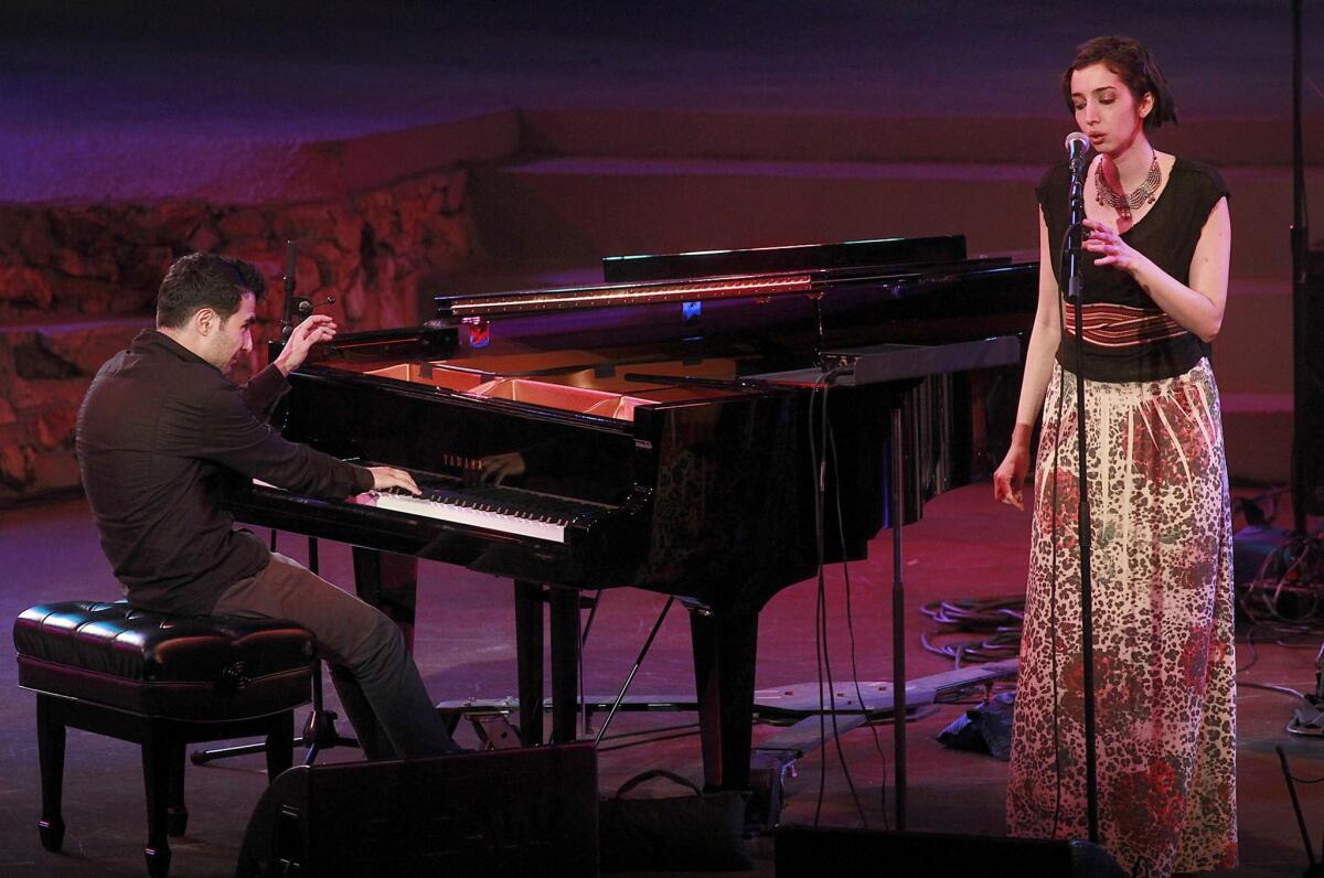 Pianist Tigran Hamasyan with vocalist Areni Agbabian onstage at the Angel City Jazz Festival in 2011.