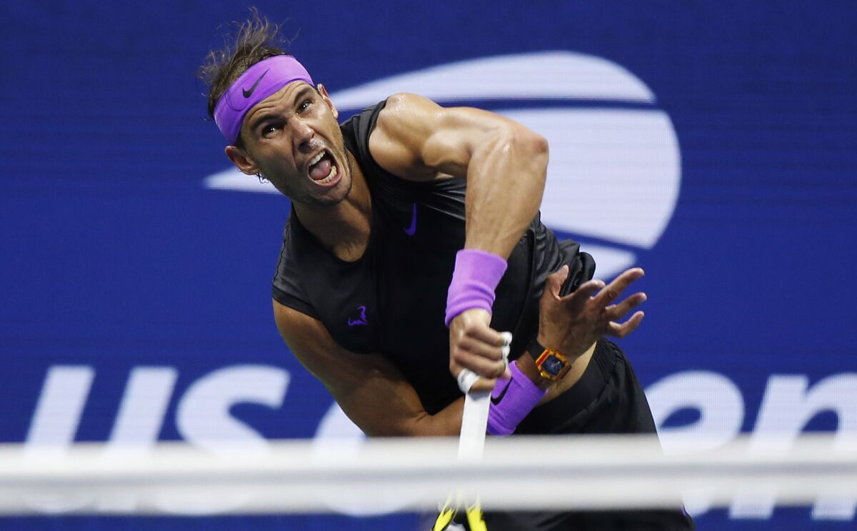 Rafael Nadal serves during his victory over Marin Cilic in the fourth round of the U.S. Open on Monday.