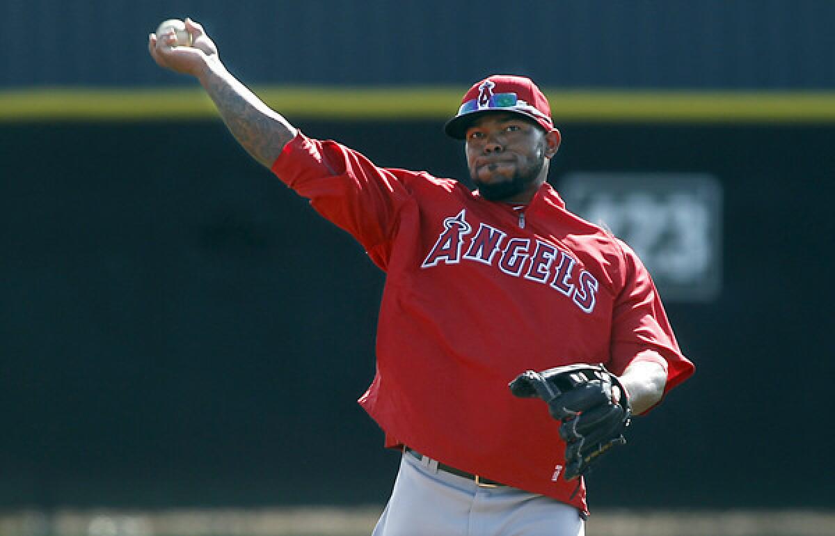 Angels second baseman Howie Kendrick, taking infield drills earlier this spring, has three home runs in six exhibition games.
