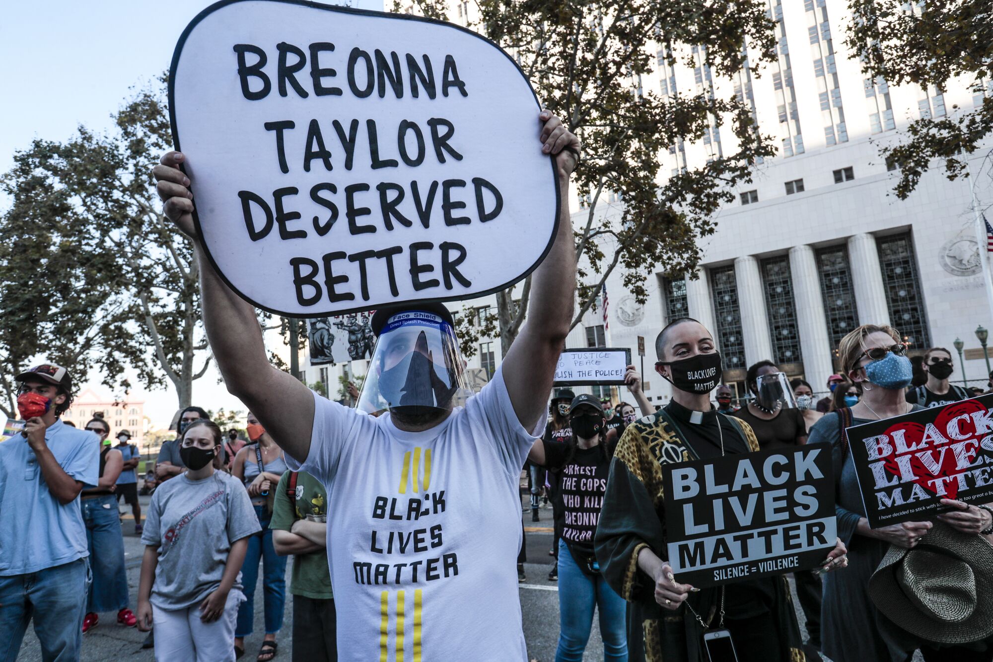 Hundreds of protesters converge during a demonstration in downtown Los Angeles. 