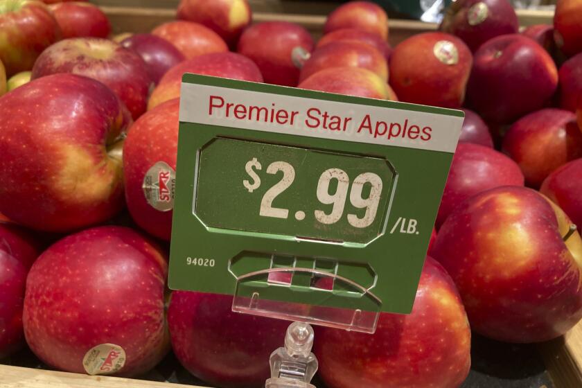FILE - Shown is the price of apples at a market in Philadelphia, Thursday, June 16, 2022. Inflation at the wholesale level rose 8.5% in September from a year earlier, its third straight decline though it is still at a painfully high level. Wednesday, Oct. 12, report from the Labor Department also showed that the producer price index — which measures price changes before they reach the consumer — rose 0.4% in September from August, after two months of declines.(AP Photo/Matt Rourke, File)