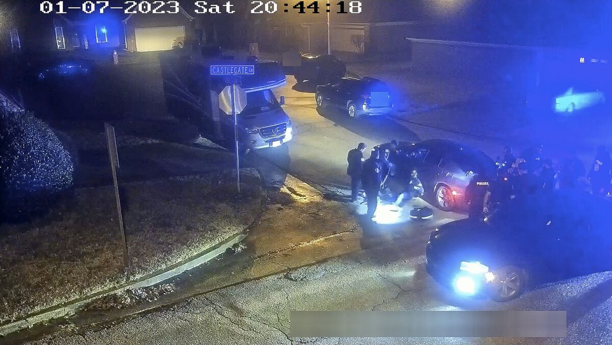 The image from video released on Jan. 27, 2023, and partially redacted by the City of Memphis, shows Tyre Nichols seated leaning against a car during a brutal attack by five Memphis police officers on Jan. 7, 2023, in Memphis, Tenn. Nichols died on Jan. 10. The five officers have since been fired and charged with second-degree murder and other offenses. (City of Memphis via AP)