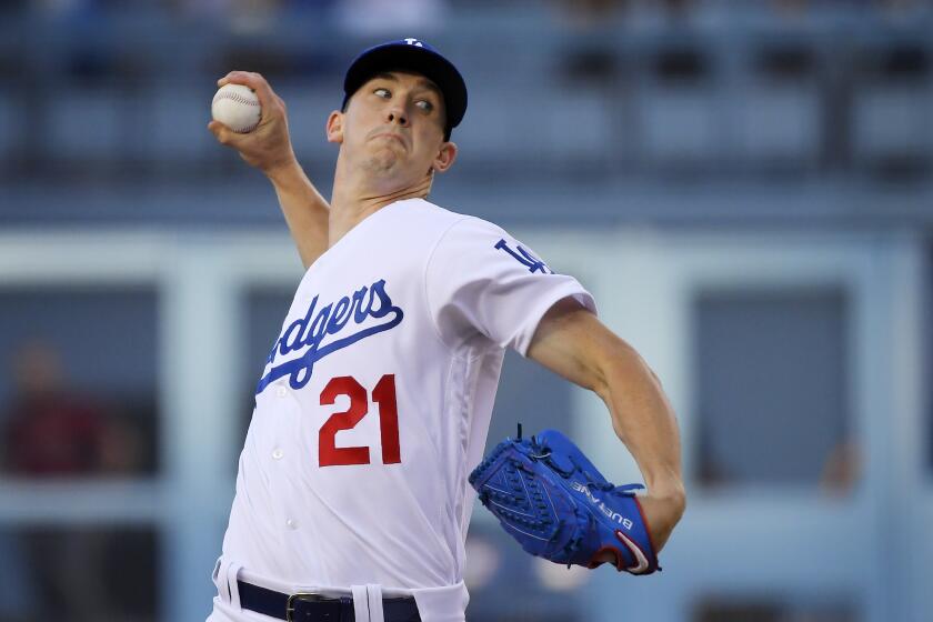 Los Angeles Dodgers starting pitcher Walker Buehler throws during the first inning of the team's baseball game against the Arizona Diamondbacks on Wednesday, July 3, 2019, in Los Angeles. (AP Photo/Mark J. Terrill)