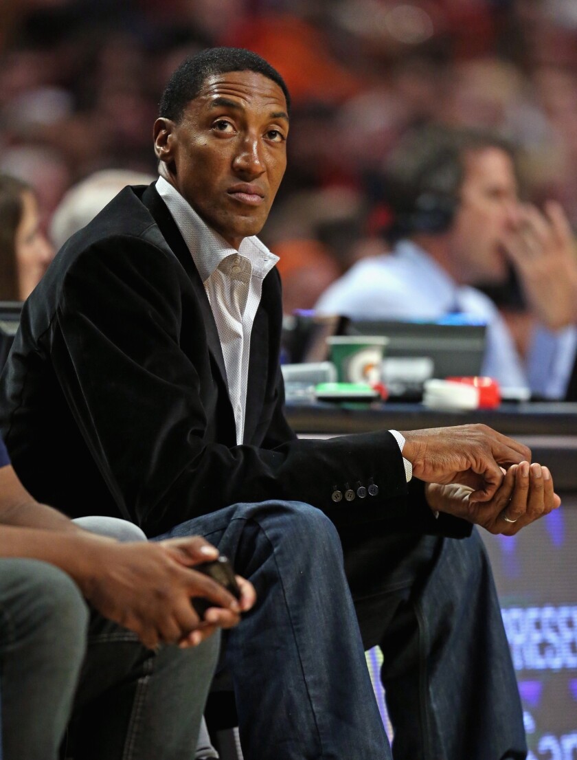 Former player Scottie Pippen of the Chicago Bulls takes in a game between the Bulls and the Los Angeles Clippers at the United Center on January 24, 2014.