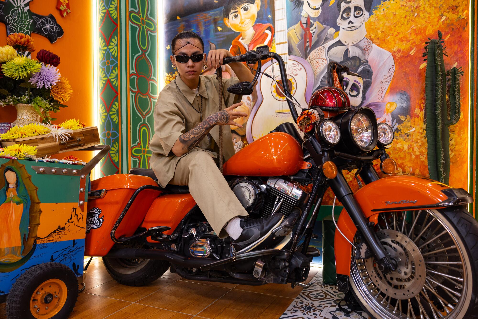 In Vietnam, an unlikely outpost for Chicano culture 7 Nguyen Phuoc Thien on a motorbike