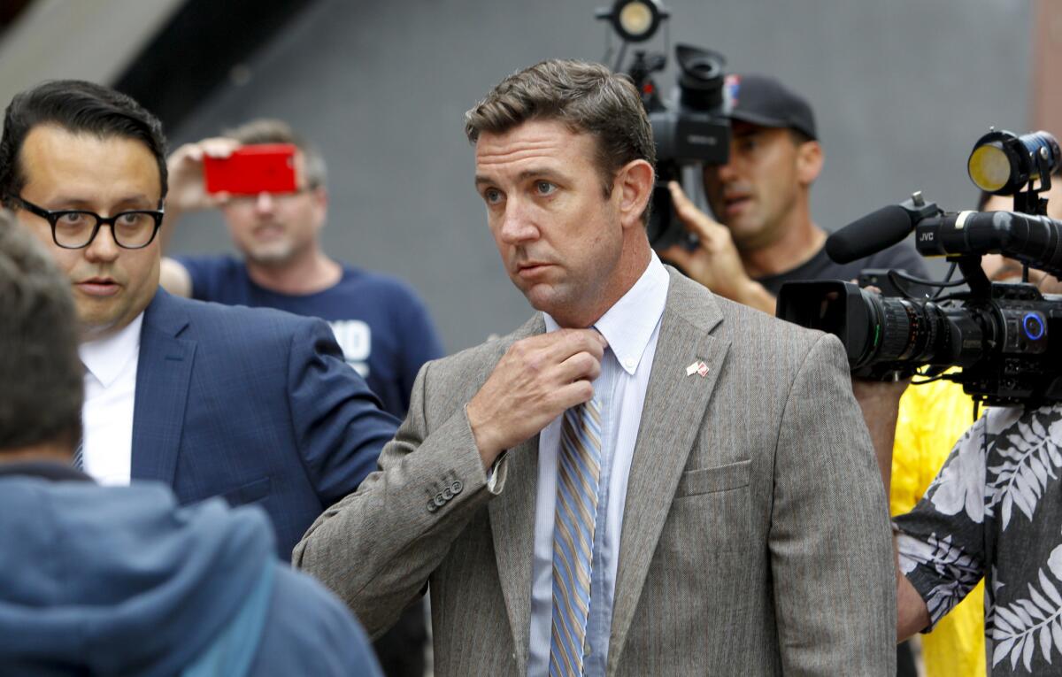 U.S. Rep. Duncan Hunter (R-Alpine) leaves a San Diego federal courthouse last month after a hearing. He and his wife face federal charges of misspending political donations on personal items.