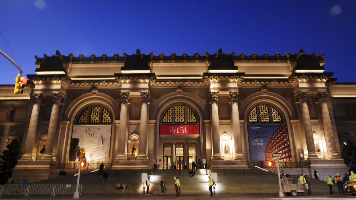 A nighttime view of the Metropolitan Museum of Art.
