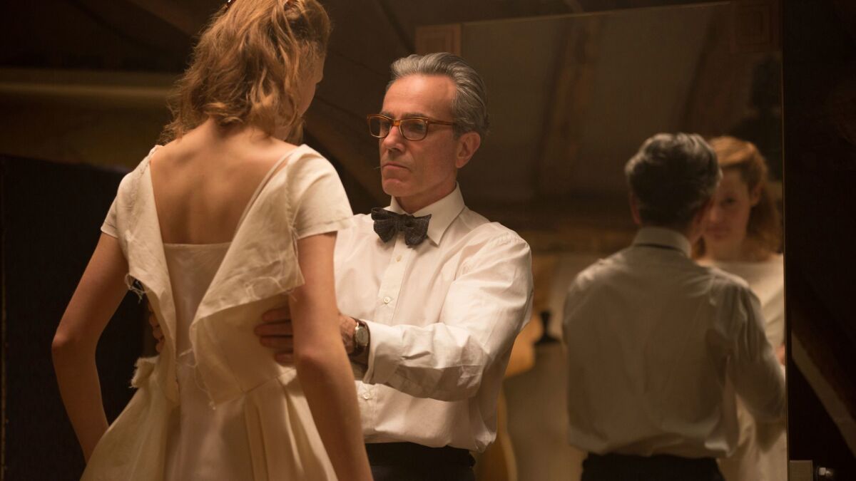 Vicky Krieps, left, and Daniel Day-Lewis in a scene from "Phantom Thread."