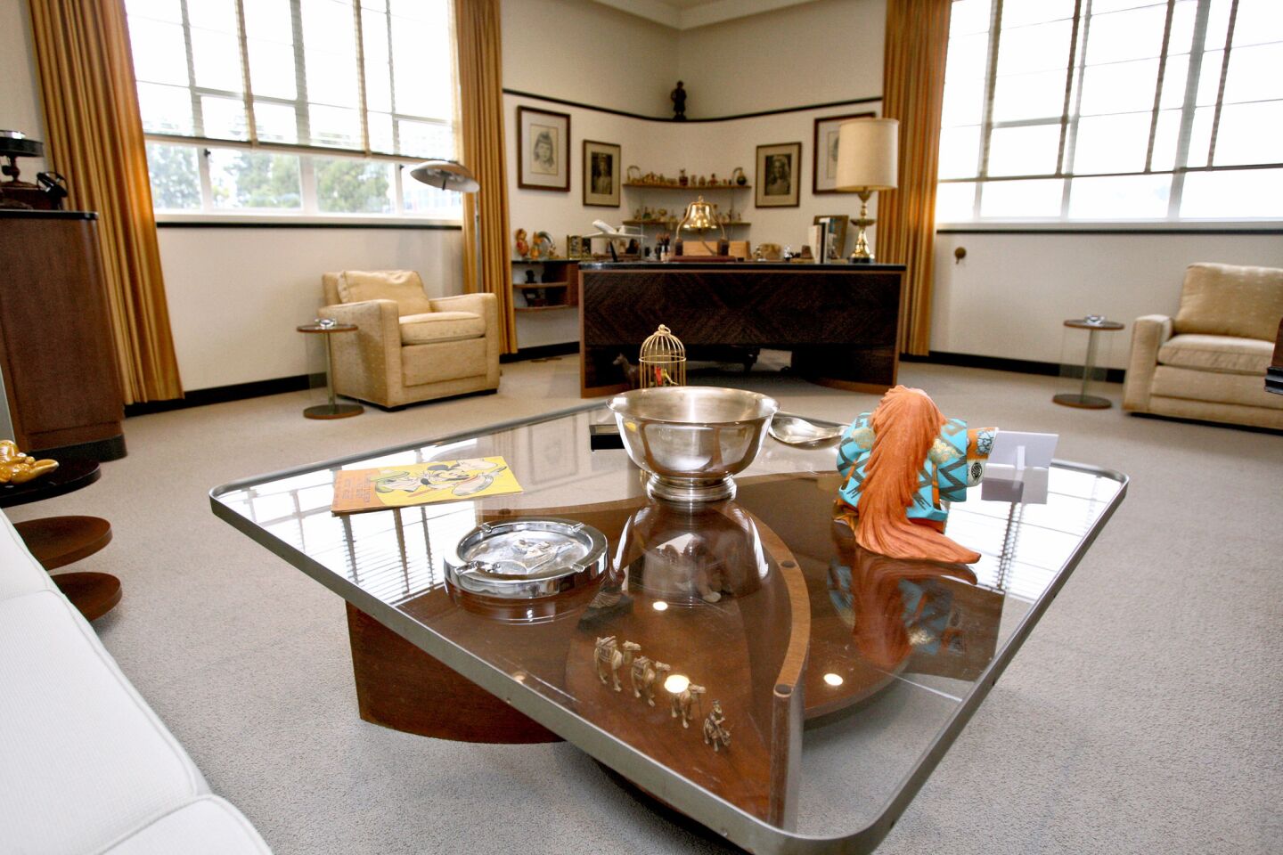 To celebrate the 75th anniversary of the Walt Disney Studios in Burbank, the Walt Disney Archives restored Walt Disney's original office suite, which was shown to members of the media on Tuesday, December 22, 2015. Above, another view of Walt Disney's main office. The space is located in the original Animation building and was occupied by Walt Disney from 1940 to 1966, when he passed away at the age of 65 from lung cancer. The permanent exhibit will be opened to Disney employees, cast members and studio visitors and it will be added to tours of the studio lot that gold members of the official fan club, D23, can take.
