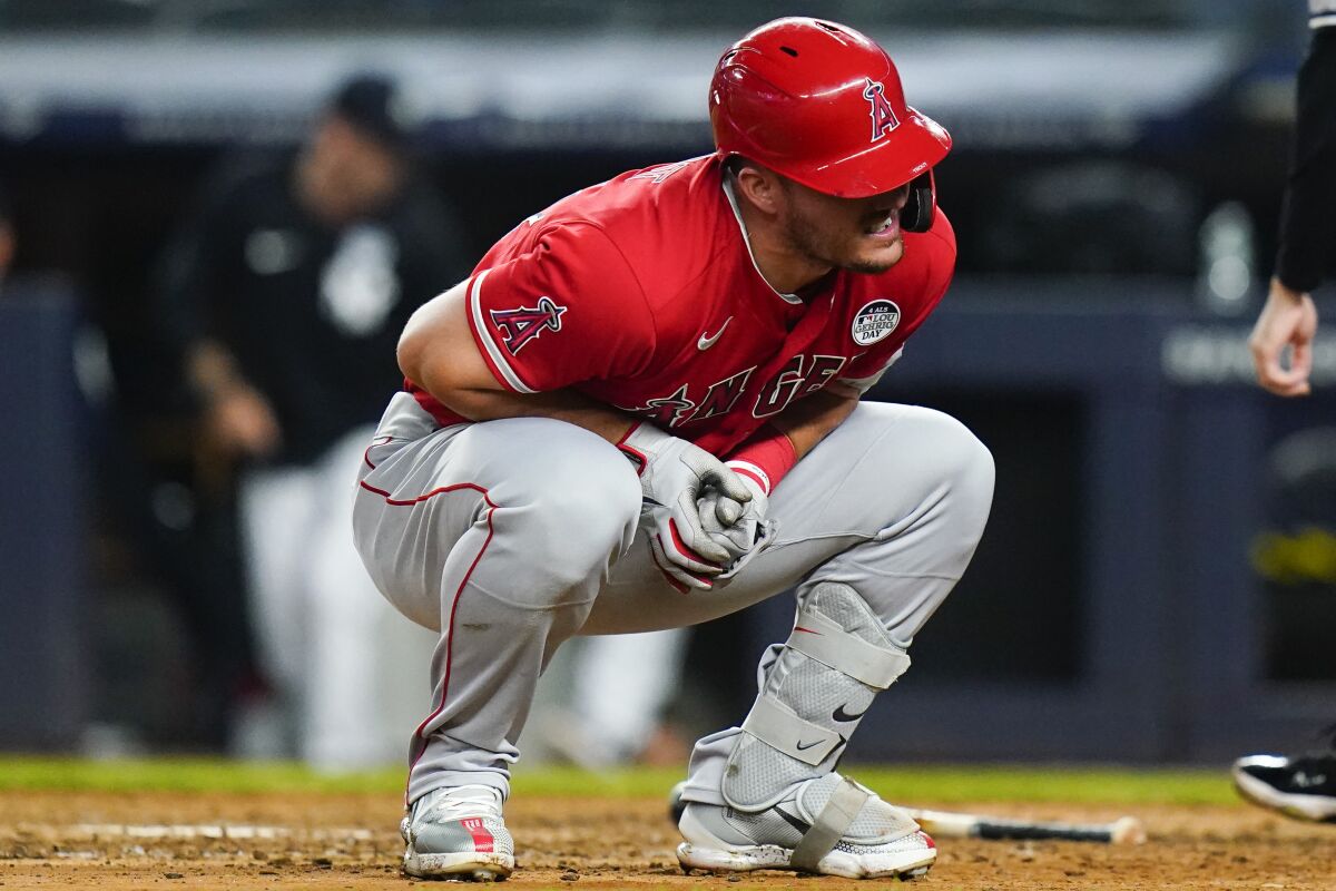 Los Angeles Angels' Mike Trout reacts after he was hit by a pitch during the ninth inning in the second baseball game of a doubleheader against the New York Yankees, Thursday, June 2, 2022, in New York. (AP Photo/Frank Franklin II)