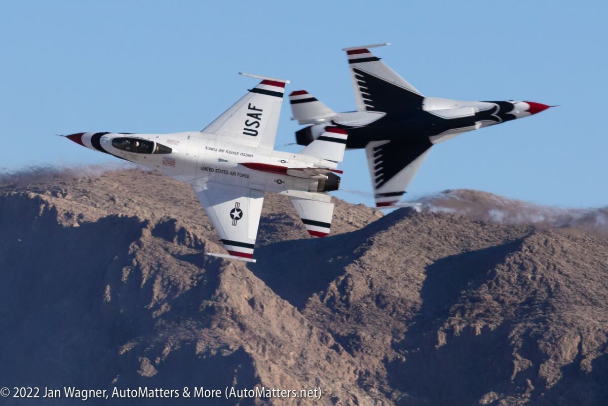 U.S. Air Force Thunderbirds in opposing cross maneuver