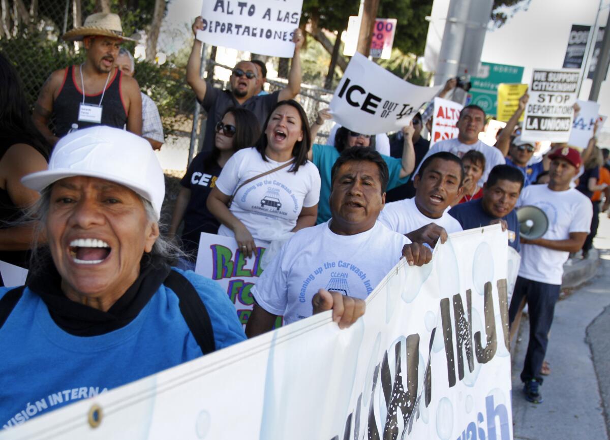 More than 200 immigrant workers, labor allies and community supporters marched in Los Angeles on Aug. 27.