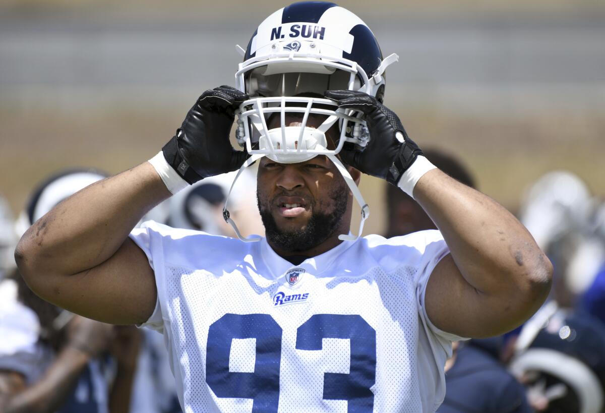 Defensive lineman Ndamukong Suh practices with the Rams on May 29 in Thousand Oaks.