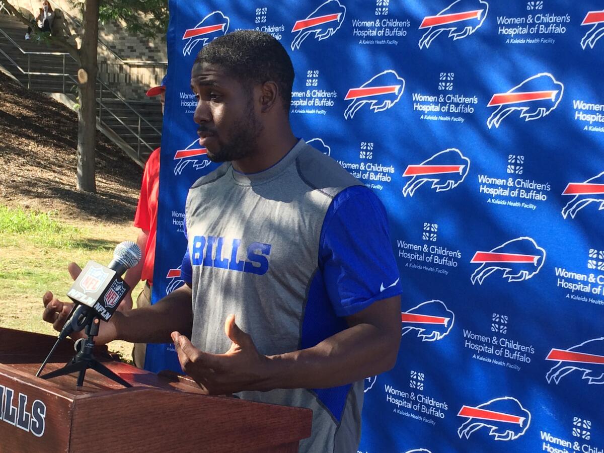 Reggie Bush speaks during a news conference after signing with the Bills on Aug. 1.