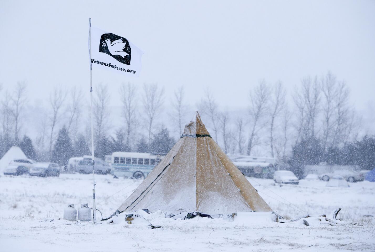 Heavy snow and low temperatures have come to the Oceti Sakowin Camp on the edge of North Dakota's Cannonball River just north of the Standing Rock Sioux Reservation.