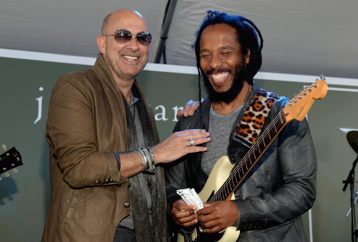 Designer John Varvatos, left, and musician Ziggy Marley at the Stuart House benefit on April 26.