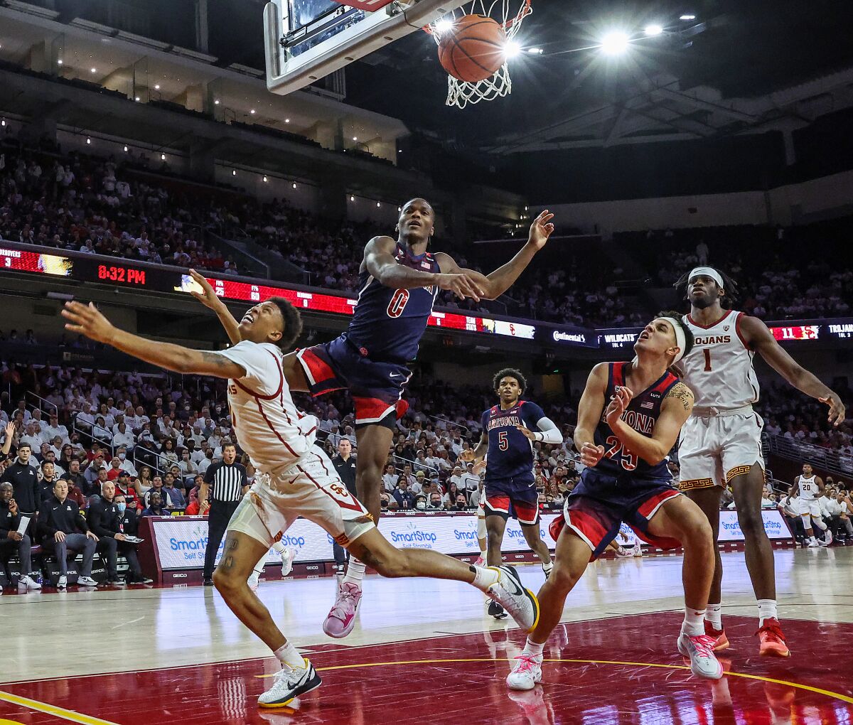 Arizona guard Bennedict Mathurin blocks USC guard Boogie Ellis' shot Tuesday night