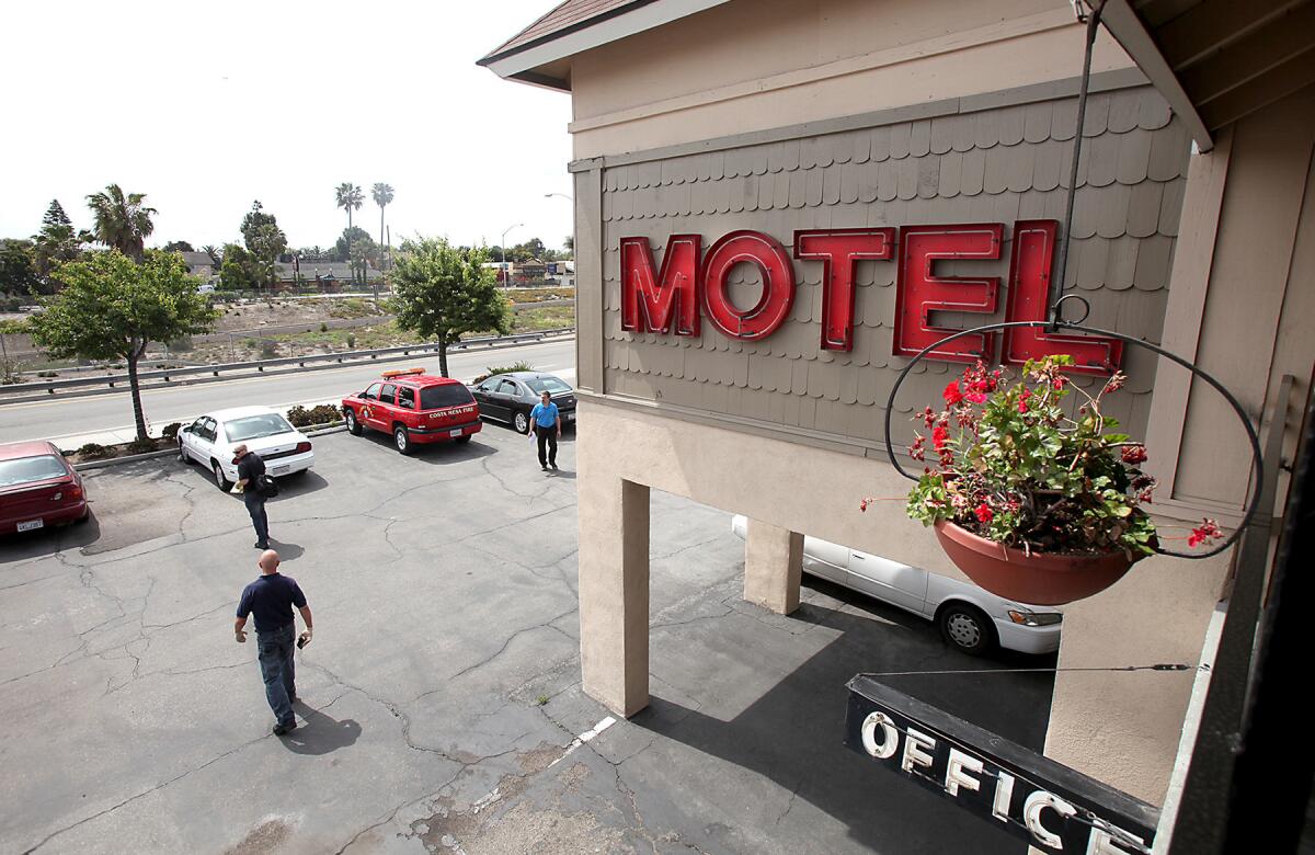 The Sandpiper Motel in Costa Mesa, shown above last year, is one the properties cited by backers of a new city ordinance providing for fines against motels that make a large volume of calls to the police.