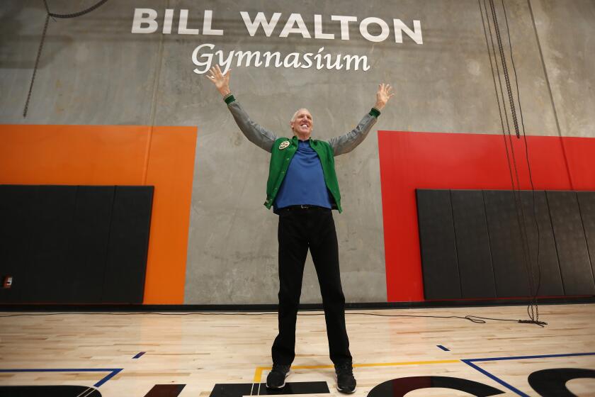 Basketball legend a La Mesa native Bill Walton poses for photos at the dedication of the Boys & Girls Clubs of East County grand opening celebration of the Brady Family Clubhouse and Eleni and Wolfgang Gagon Academy along with the Bill Walton Gymnasium in La Mesa on Oct. 4, 2018. (Photo by K.C. Alfred/San Diego Union-Tribune)