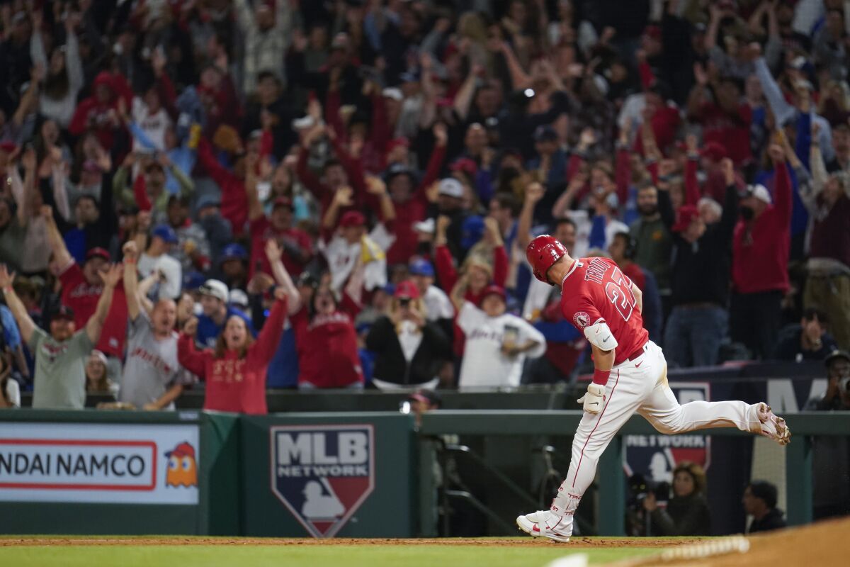 Mike Trout runs the bases after hitting a go-ahead, two-run home run during the seventh inning May 28, 2022.