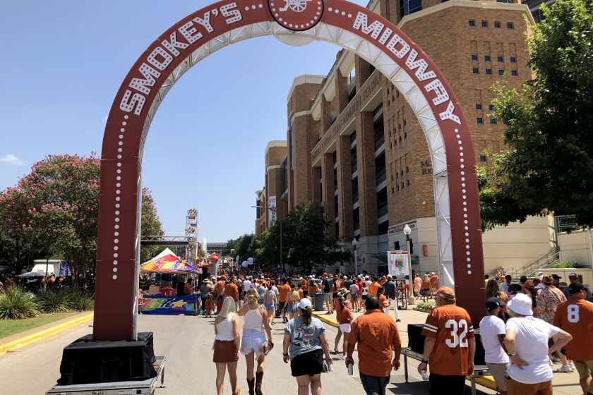 Texas Longhorns fans at the midway outside the stadium for the season opener Saturday.